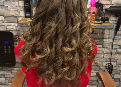 Elegant curls at K&R Hair & Nails, Lancaster, England, GB. Perfect salon styling.