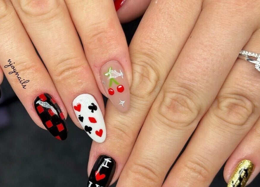 Unique nail art designs by Njoynails in Stanbridge, England, GB flaunting vibrant creativity.