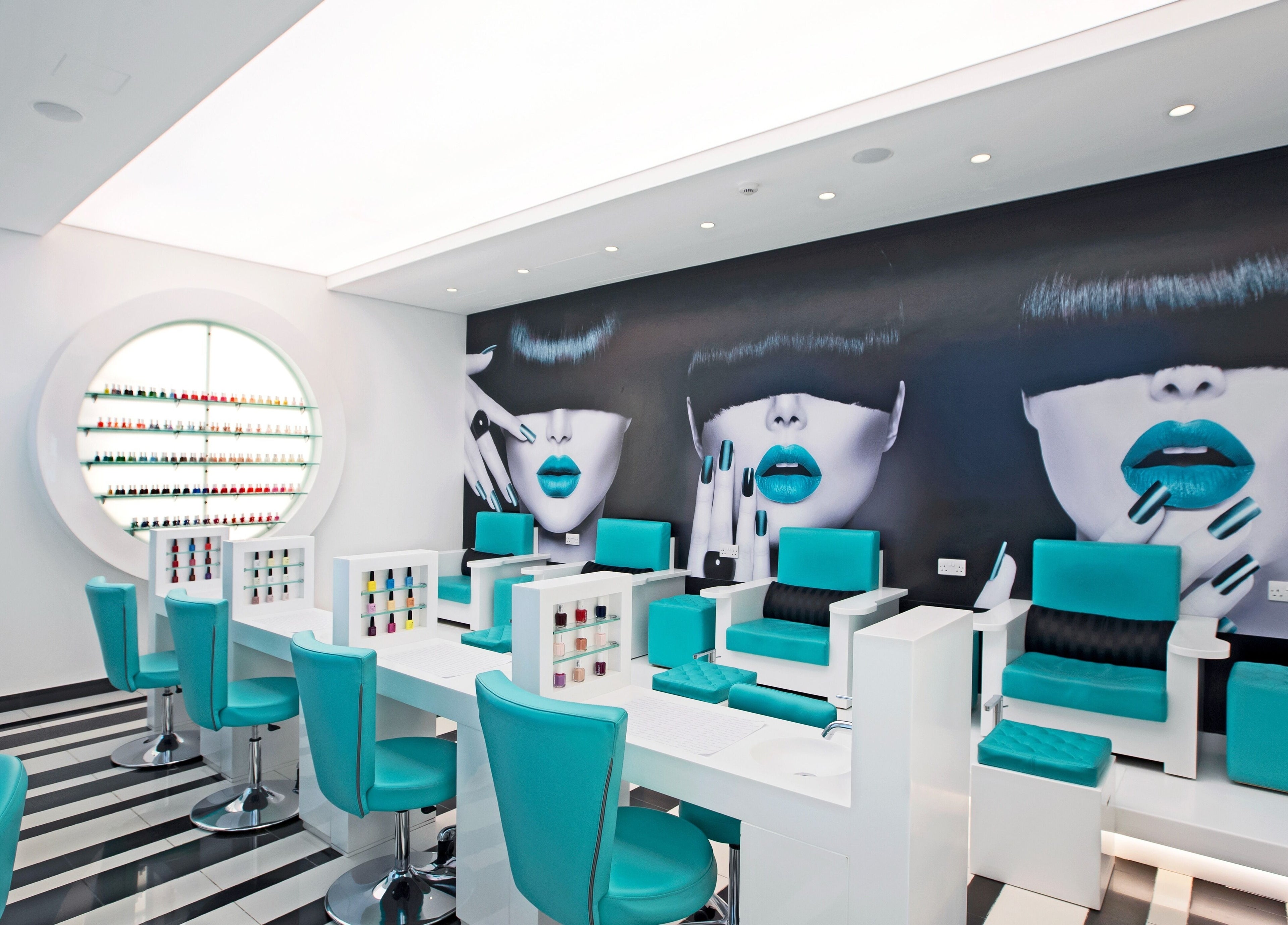 Chic nail salon at House Of Allure Beauty And Spa, أبو ظبي, أبو ظبي, AE, featuring turquoise chairs and modern decor.