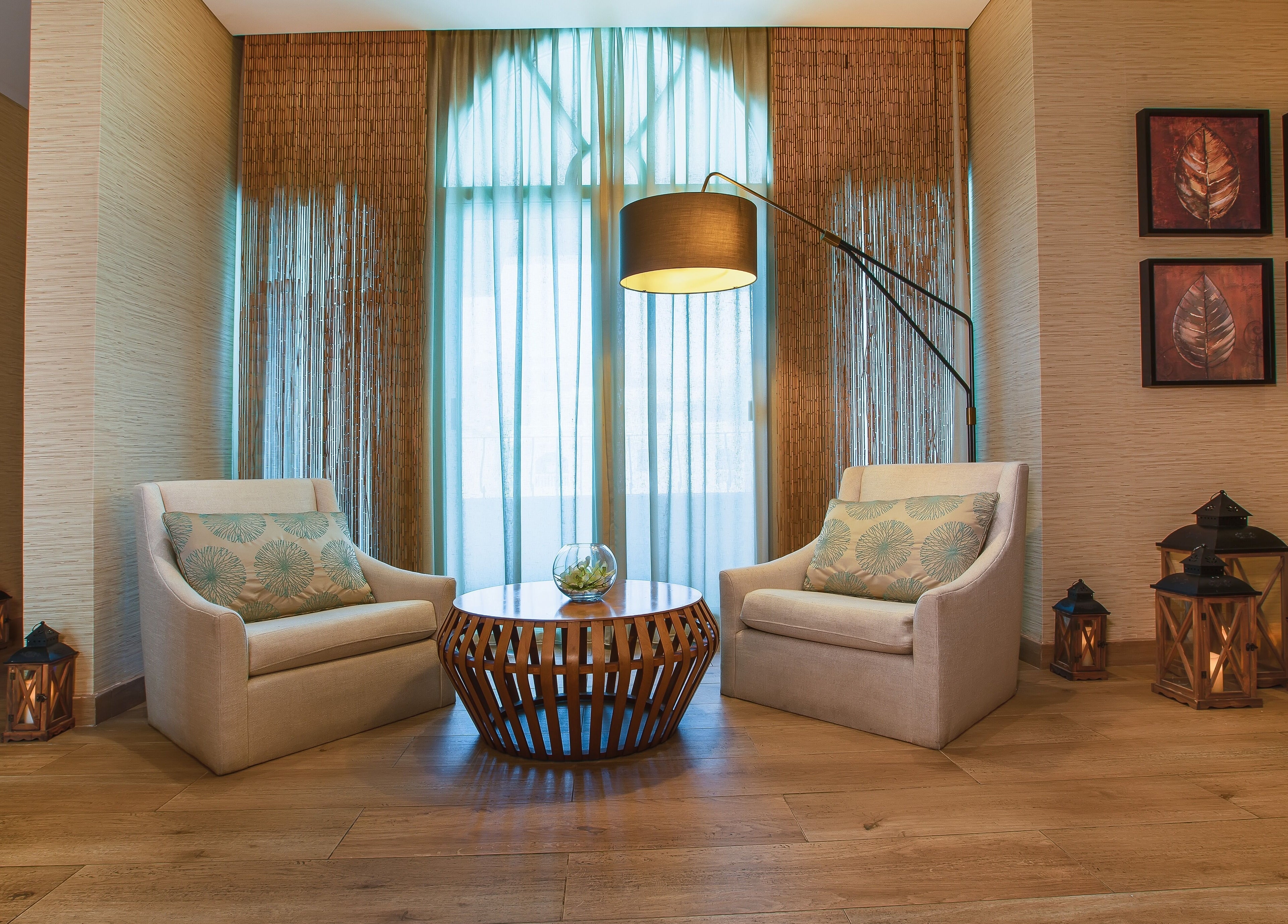 Elegant seating at House Of Allure Beauty And Spa, Abu Dhabi, AE, featuring plush chairs and ambient lighting.