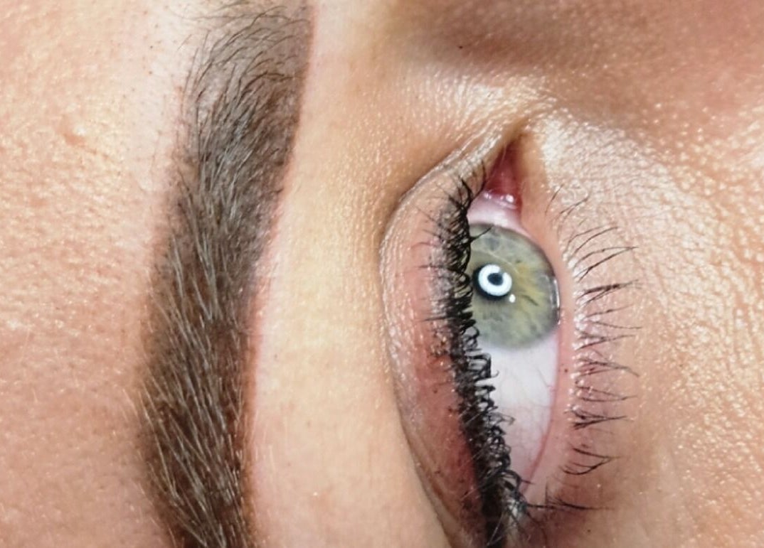 Close-up of expertly shaped eyebrow at Blushed by Olga, Hatfield, England, GB showcasing beauty perfection.