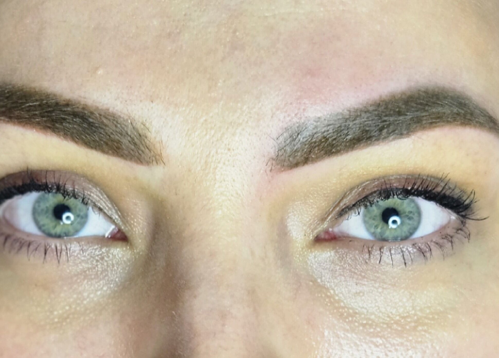 Close-up of expertly shaped eyebrows at Blushed by Olga, Hatfield, England, GB highlighting precision work.