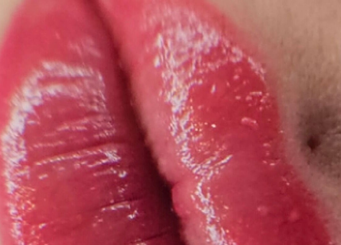 Shiny red lips showcased at Blushed by Olga in Hatfield, England, GB.