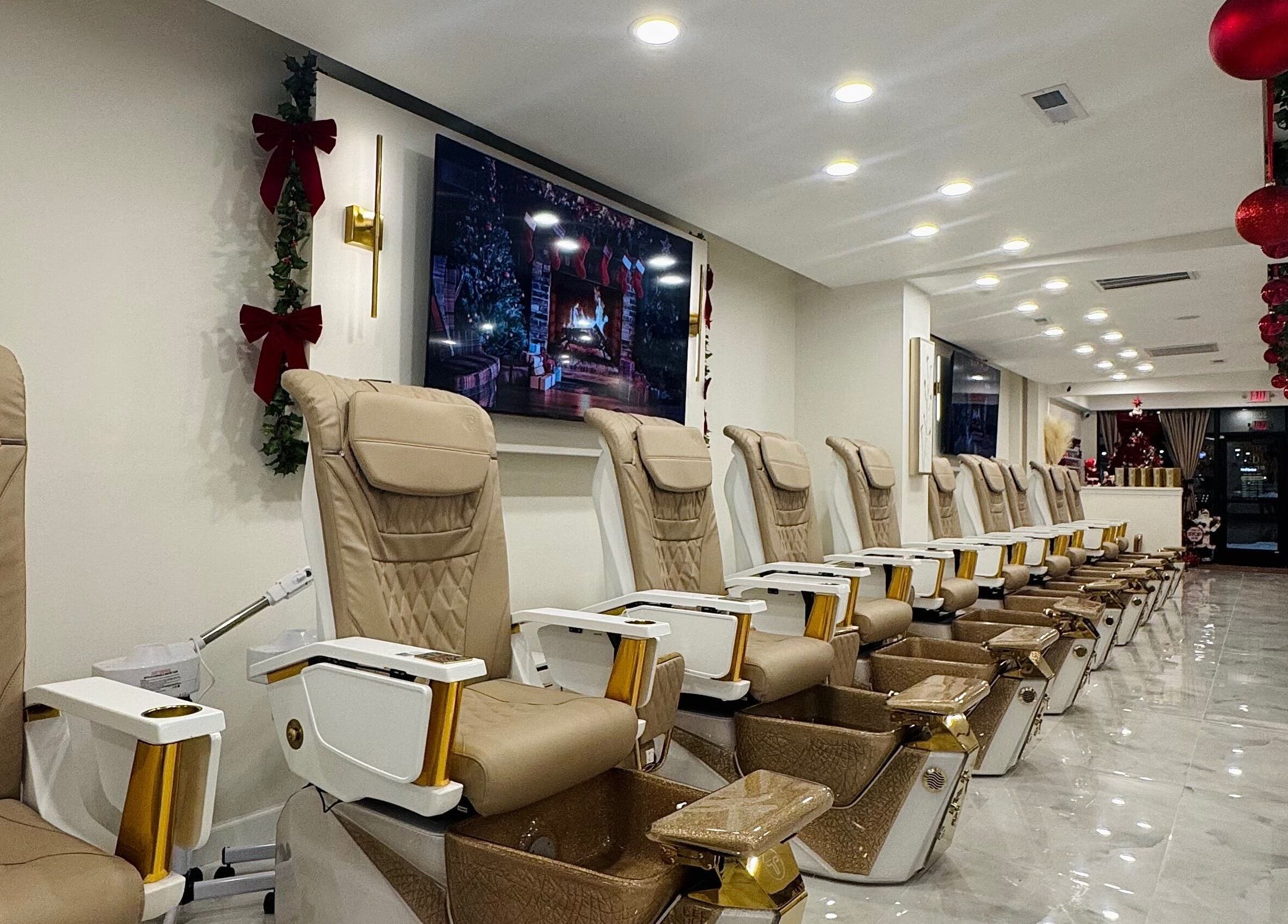 Elegant nail spa chairs in Edina Nails Spa, Delaware, Ohio, US, adorned with festive decor.