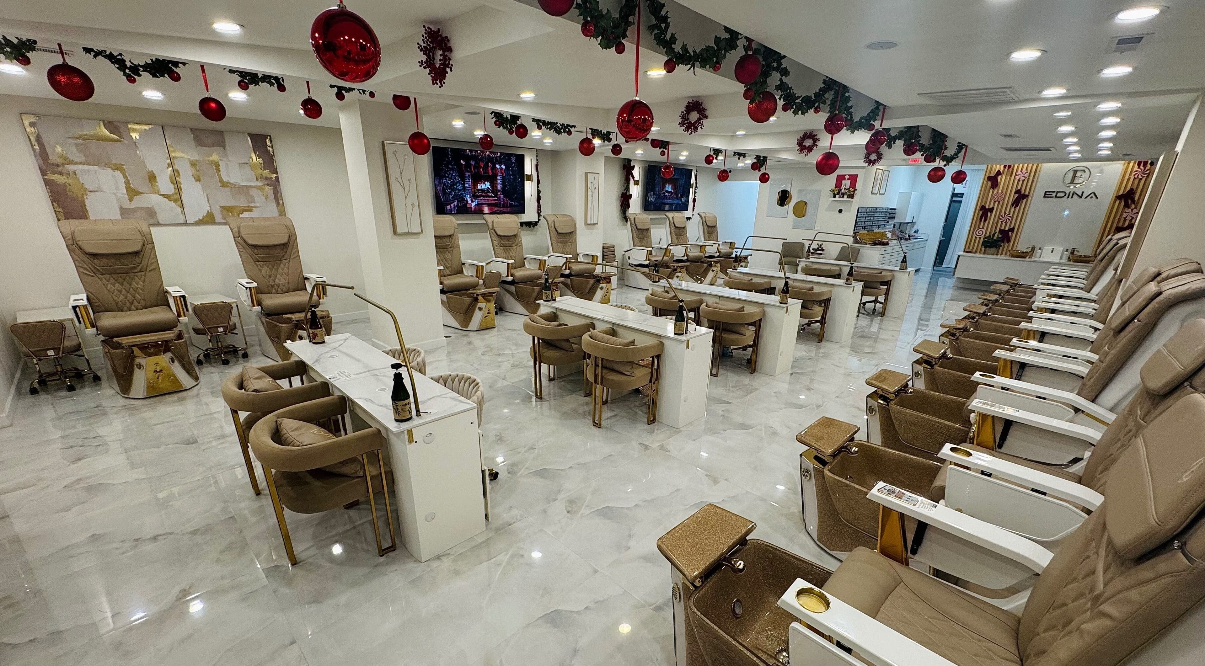 Luxurious interior of Edina Nails Spa in Delaware, Ohio, US with plush pedicure chairs.