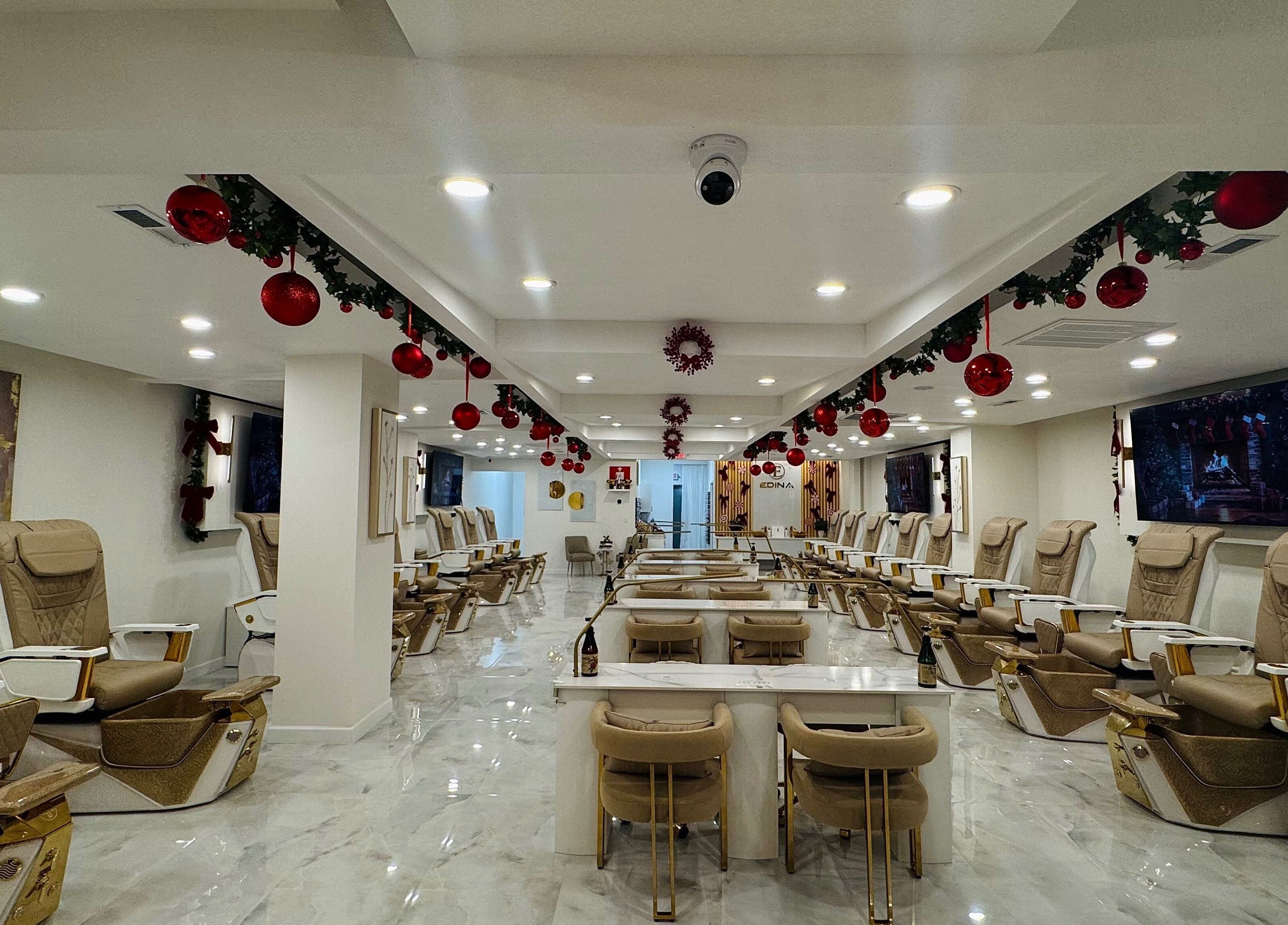 Elegant interior of Edina Nails Spa in Delaware, Ohio, US adorned with holiday decorations.
