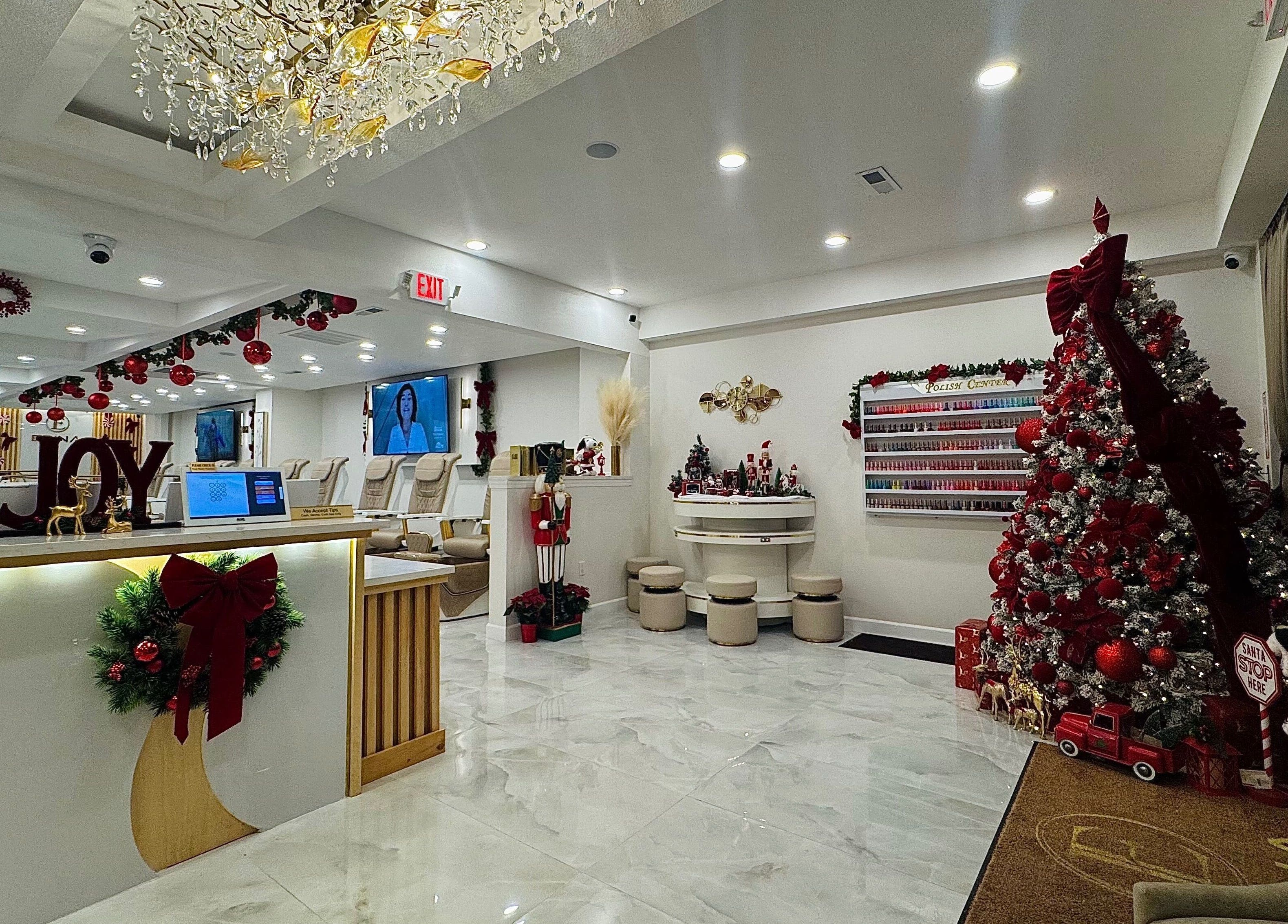 Edina Nails Spa in Delaware, Ohio, adorned with festive decor and a Christmas tree creating a welcoming ambiance.