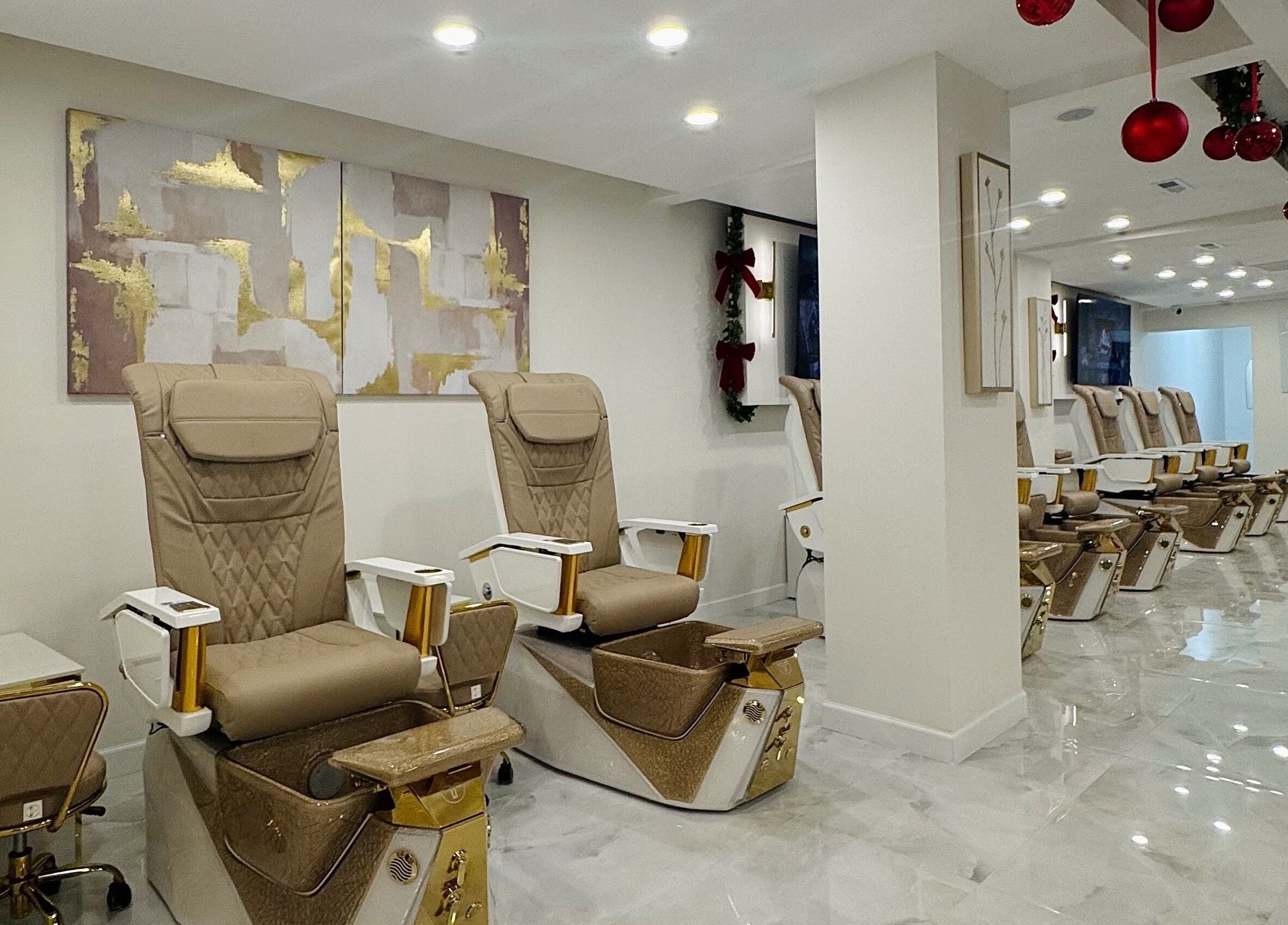 Luxurious pedicure chairs at Edina Nails Spa in Delaware, Ohio, US with elegant decor and ambient lighting.