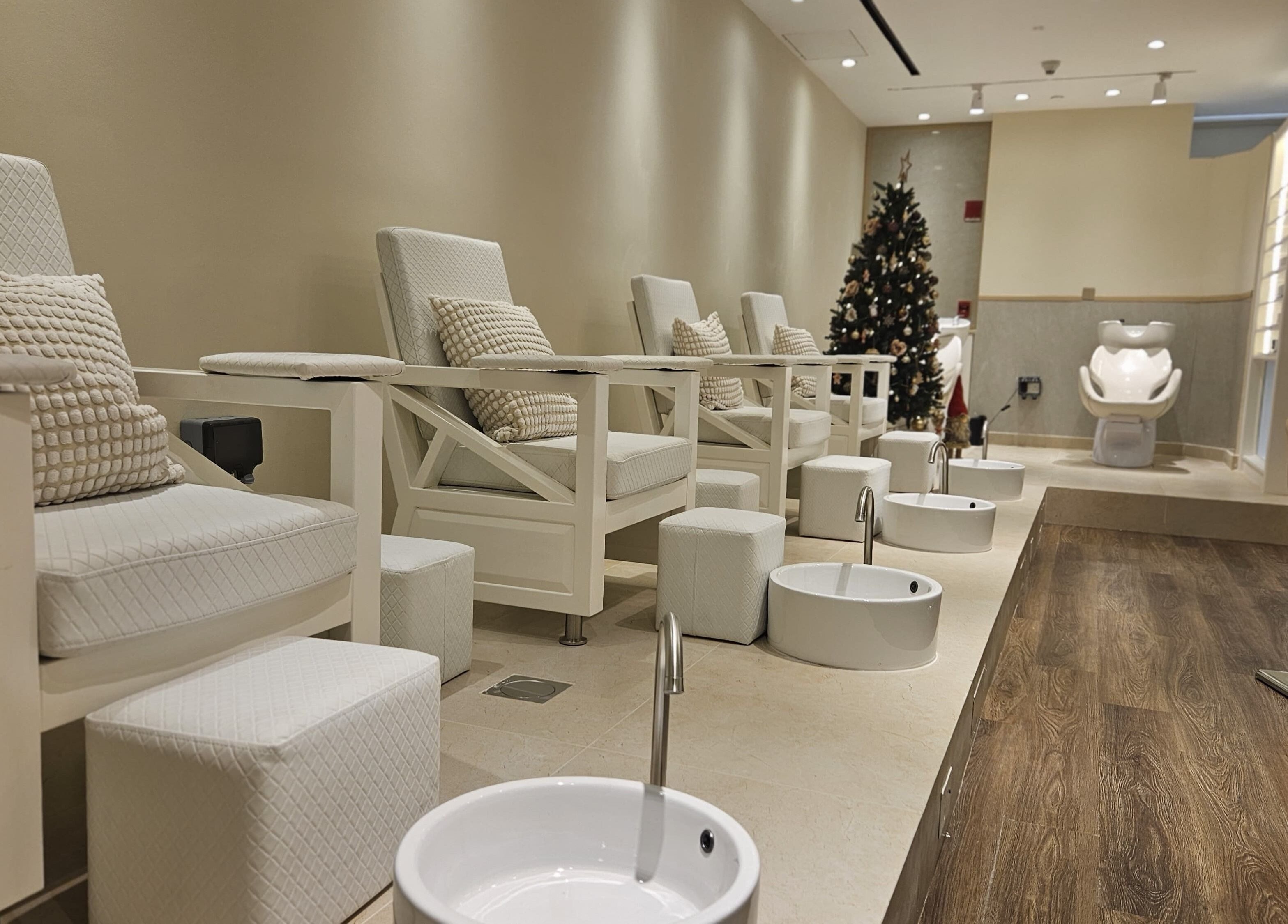 Luxurious pedicure stations at Cattleya Beauty Salon, Dubai, AE, offering a serene relaxation environment.