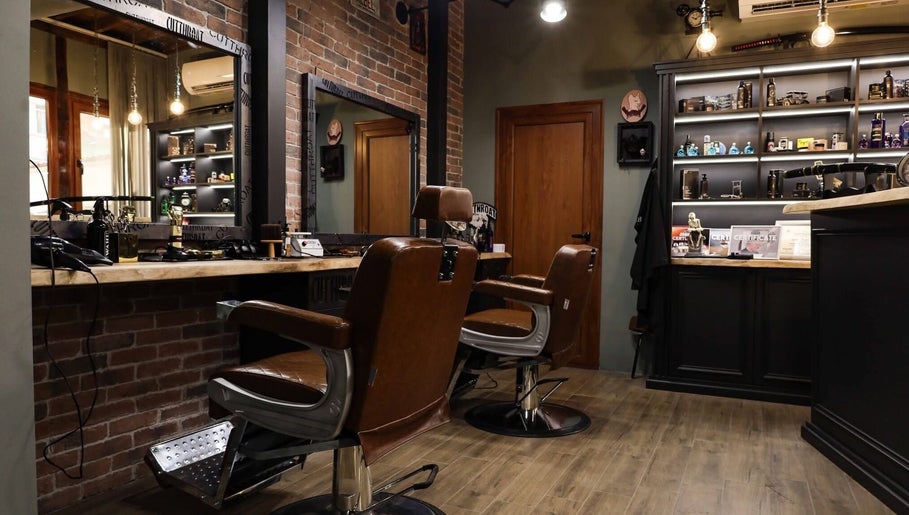 Stylish interior of Cutthroat barbershop in Stara Zagora, BG with vintage chairs and grooming products.