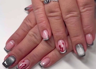 Elegant manicure with silver tips at Geeleigh Beauty Bar, Reading, England, GB.