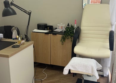 Nails by Court, Cardiff, Wales, GB: Stylish and cozy nail salon interior with modern decor.