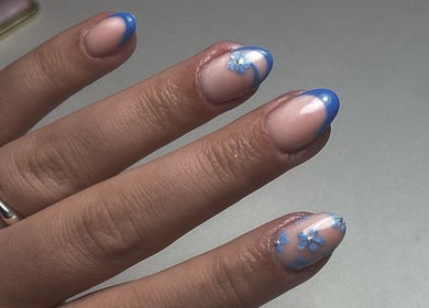 Elegant blue-floral nail art by Nails by Court, Cardiff, Wales, GB, showcasing detailed craftsmanship.