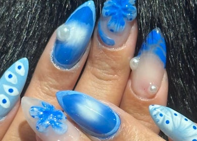 Intricate blue nail art with pearl accents at Klawed by Karissa, Vancouver, British Columbia, CA.