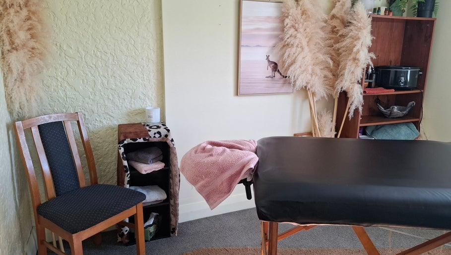 Cozy massage room at Annaste, Nelson, Nelson, NZ with a serene ambiance and comfortable treatment table.