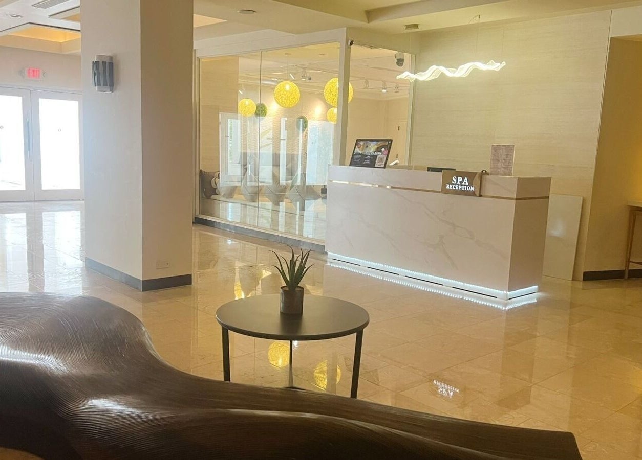 Elegant reception area of Beng Teng Spa in Tumon, GU, featuring modern decor and ambient lighting.