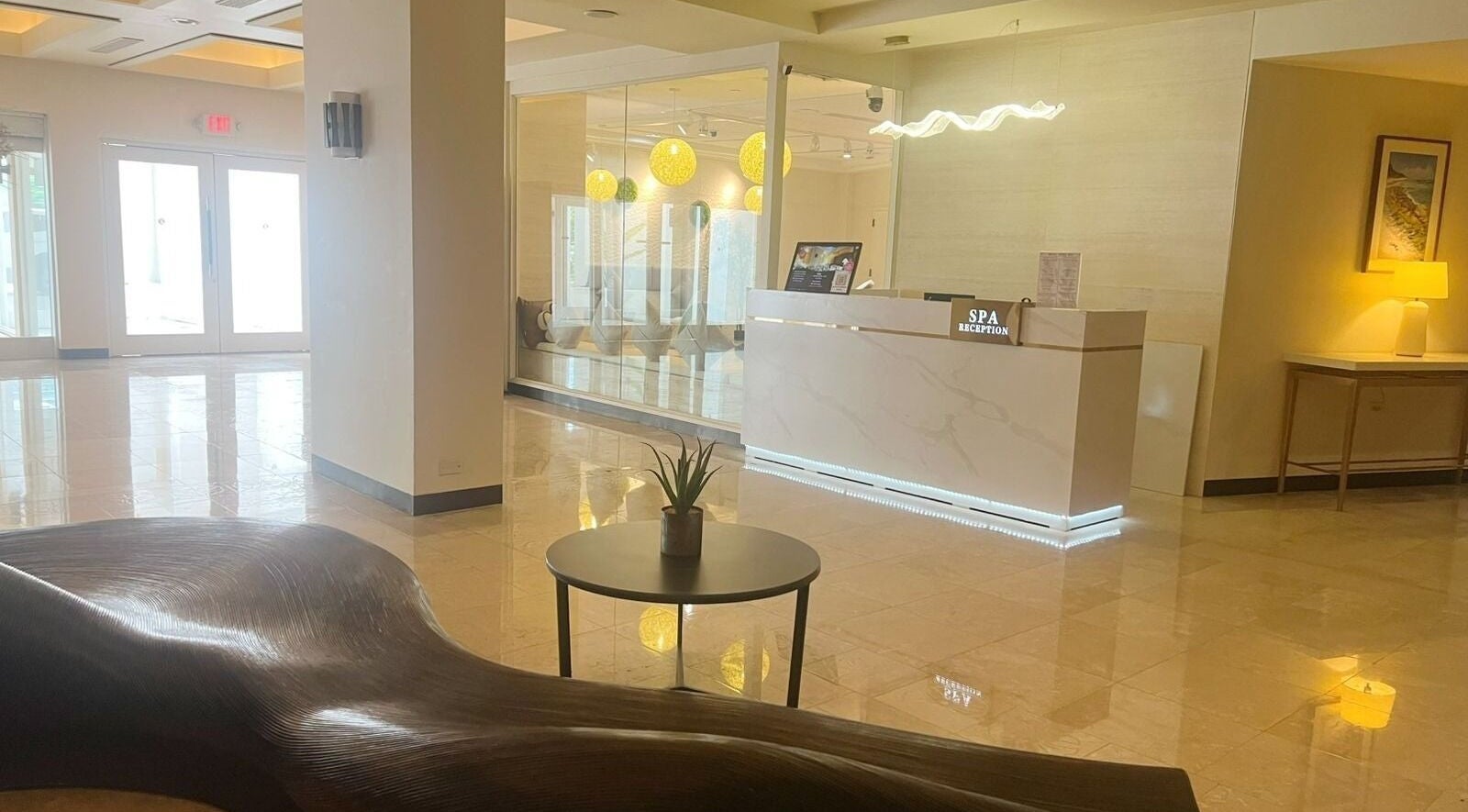 Elegant reception area of Beng Teng Spa in Tumon, GU, featuring modern decor and ambient lighting.