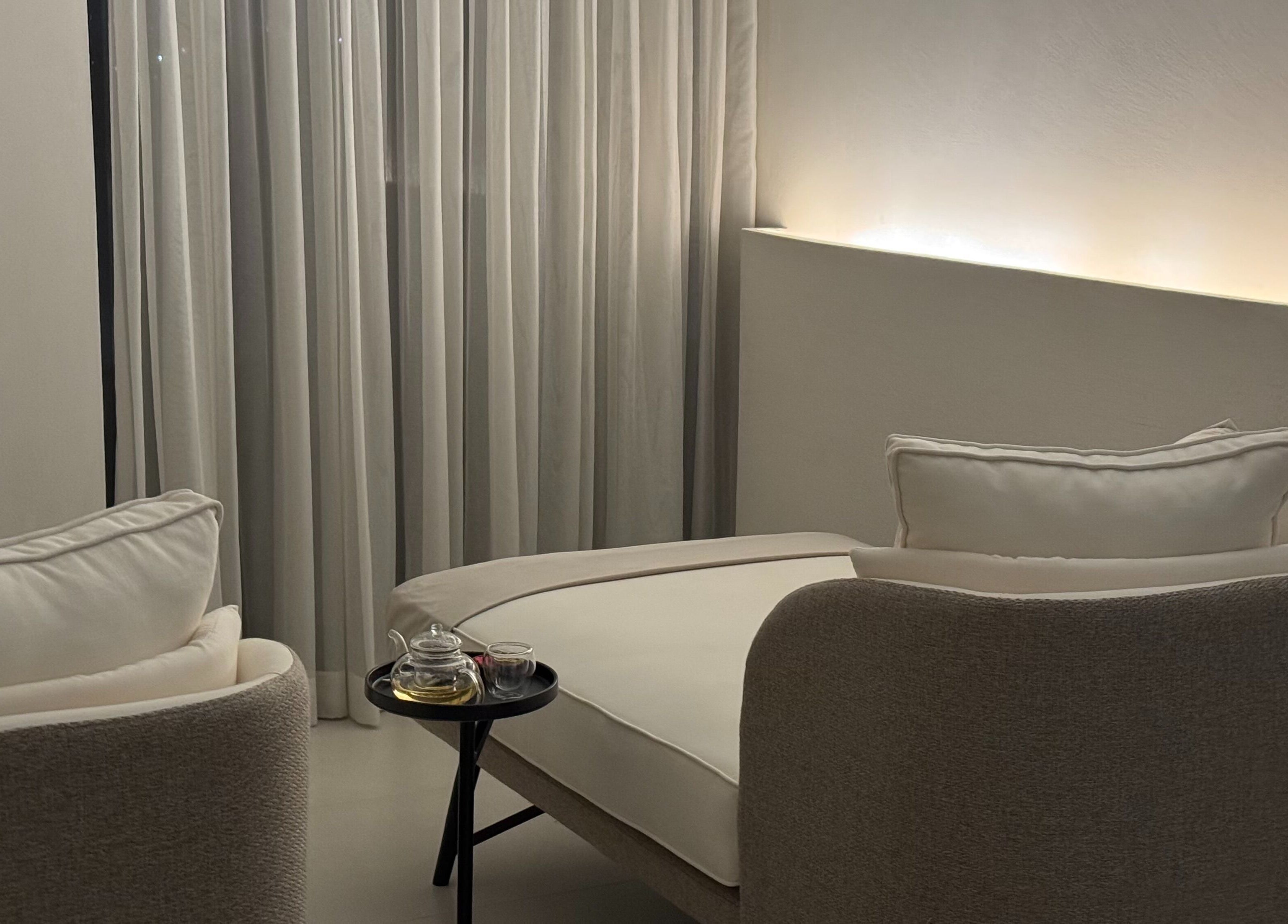 Cozy seating area at MYB Lounge & Spa in Al Khobar, Eastern Province, SA with soft lighting and plush chairs.