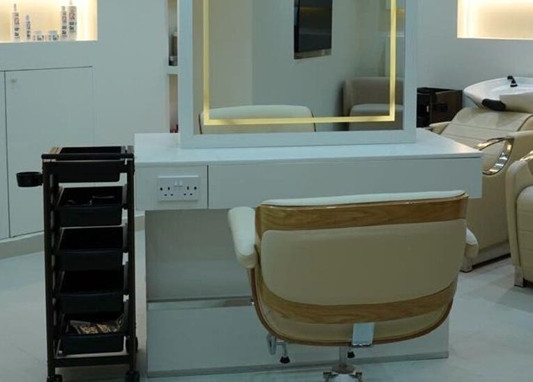 Modern salon chair and station at Beauty Experience Ladies Salon, Sharjah, Sharjah, AE. Stylish and inviting.