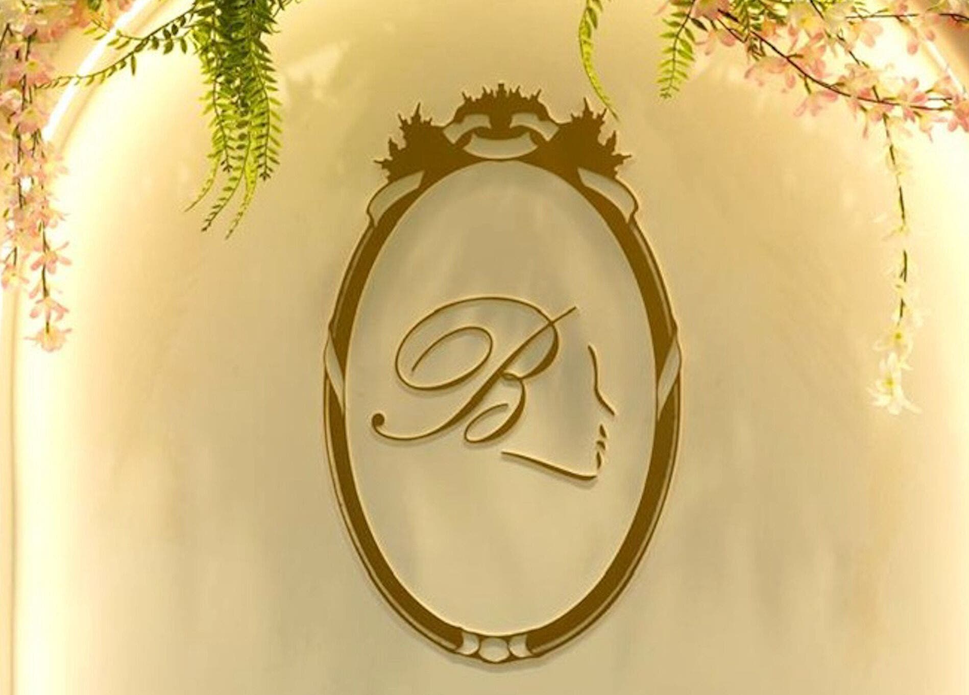 Elegant logo of Beauty Experience Ladies Salon, adorned with floral decor, Sharjah, Sharjah, AE.