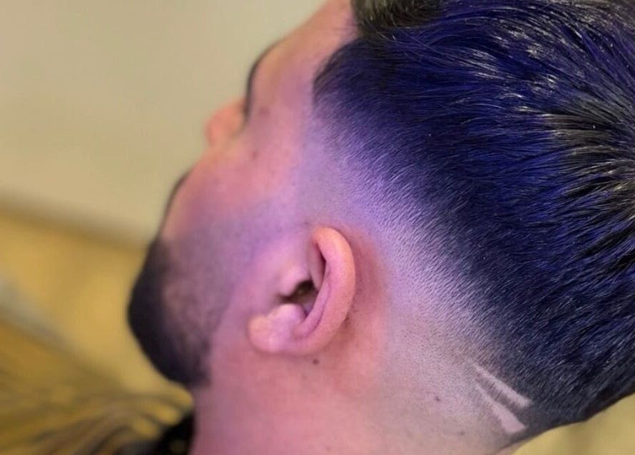 Coiffure moderne avec dégradé chez Jaad Coiffure Mixte, Saint-nicolas-de-redon, Pays De La Loire, FR.