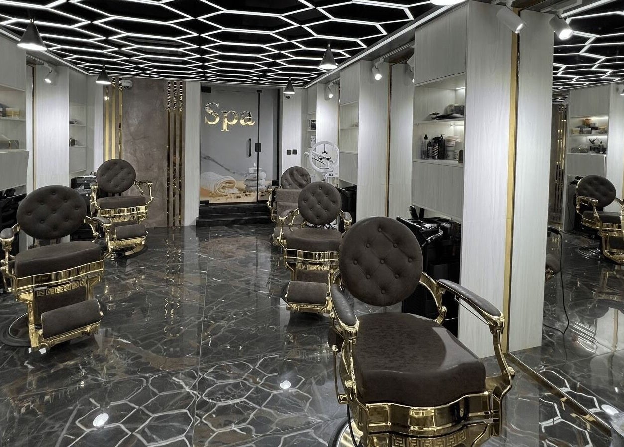 Elegant interior of Team Salon in الرياض, Riyadh Province, SA, featuring chic styling stations.