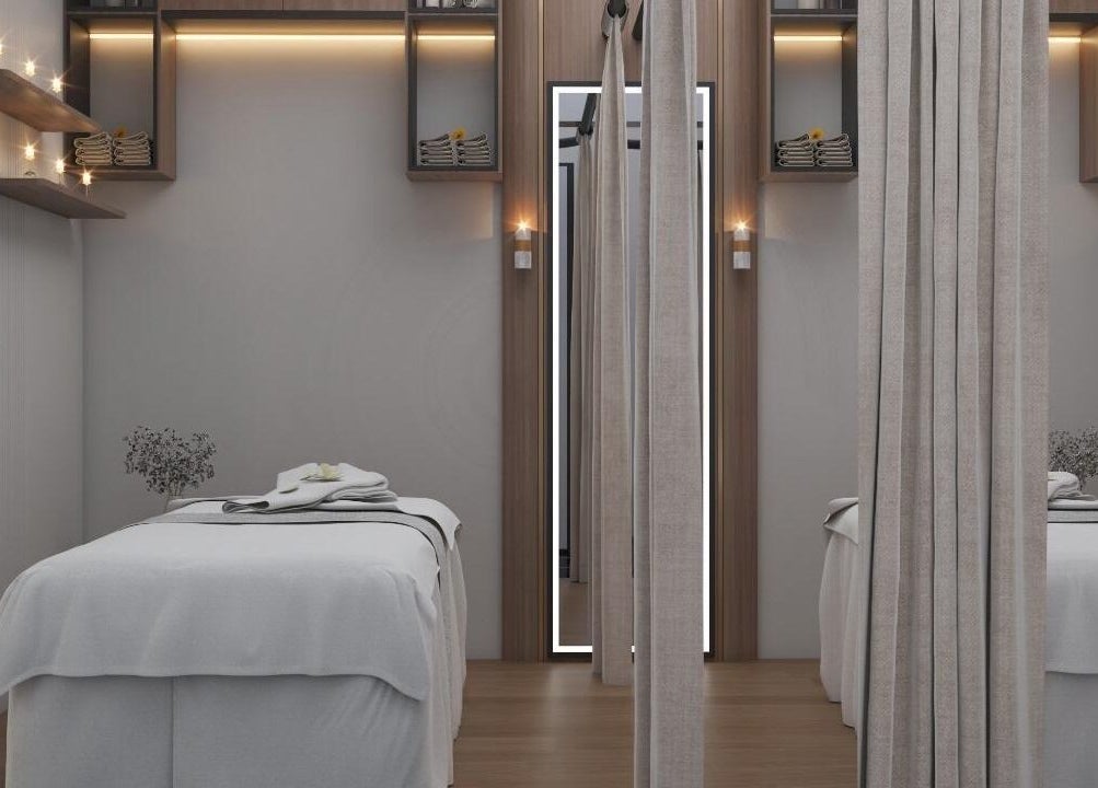 Relaxing spa room at Team Salon in الرياض, Riyadh Province, SA featuring a cozy massage bed and ambient lighting.