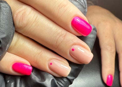 Bright pink and nude manicure at ML BEAU-TY, Waterlooville, England, GB showcasing vibrant nail art.
