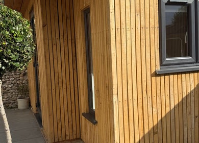 Wooden exterior at ML BEAU-TY, Waterlooville, England, GB exuding a tranquil, natural ambiance.
