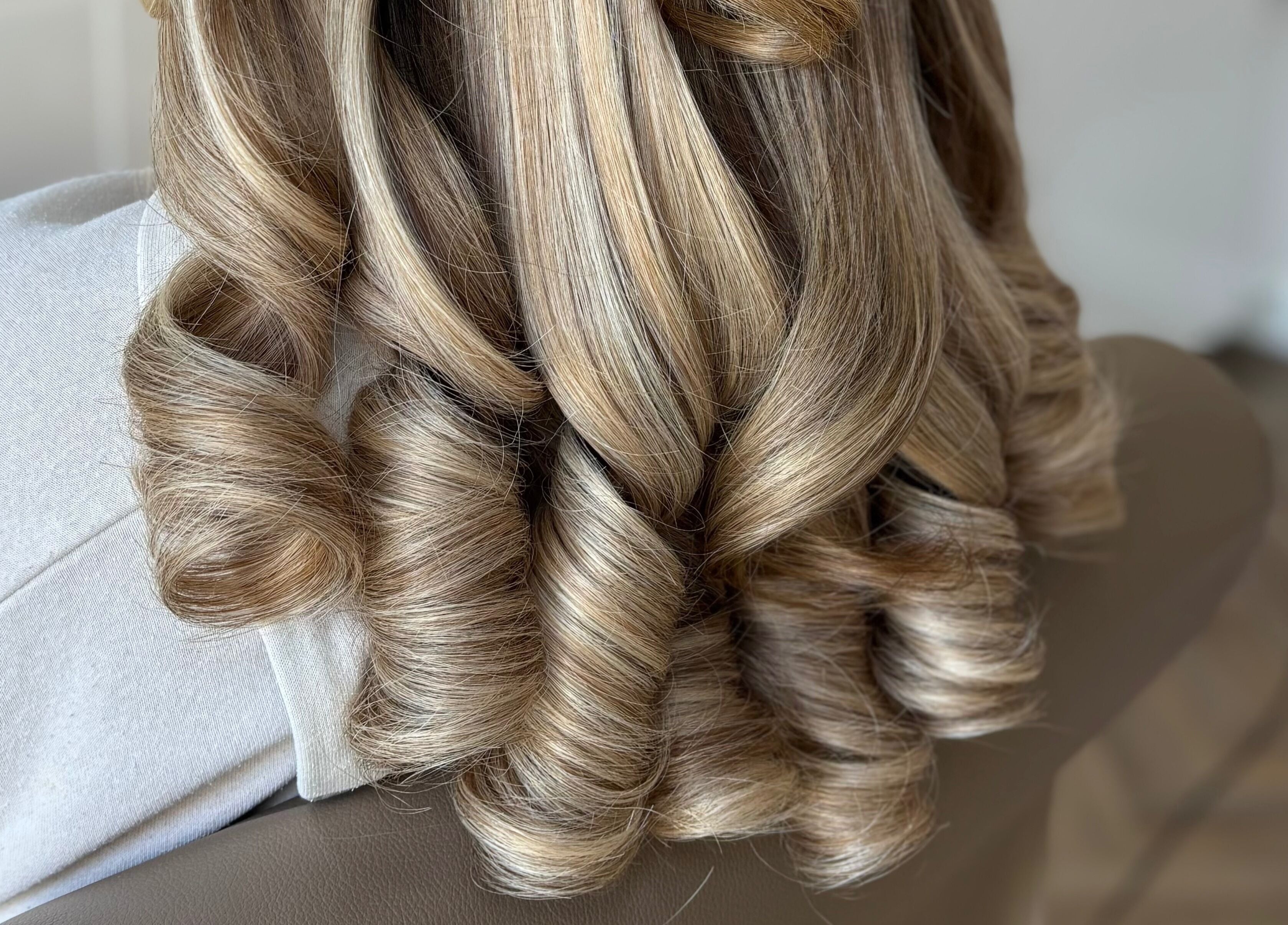 Freshly styled wavy hair at Bouncy Blowbar in Rochford, England, GB.