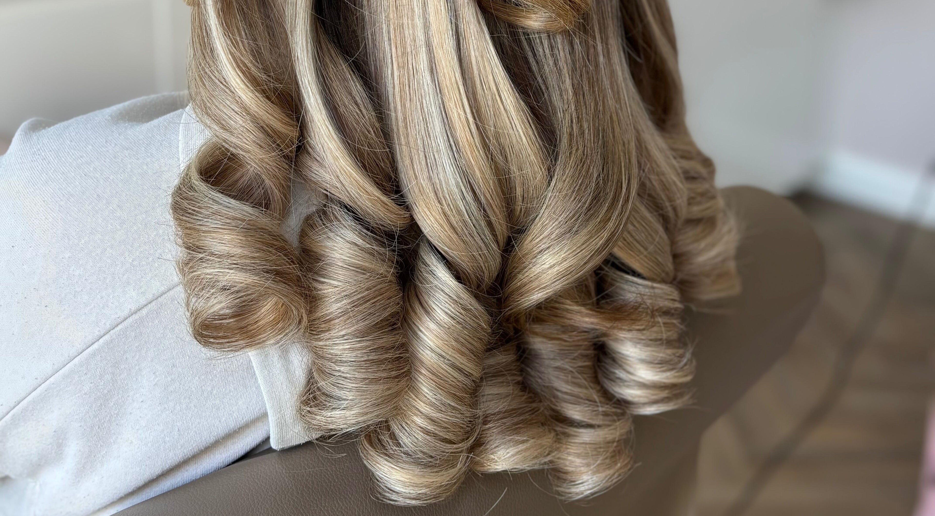Freshly styled wavy hair at Bouncy Blowbar in Rochford, England, GB.