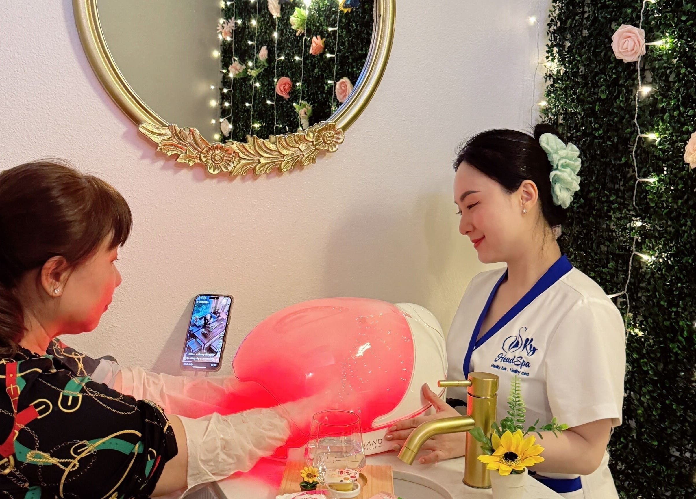 Client receiving a soothing hand treatment at Sky Head Spa, San Jose, California, US.