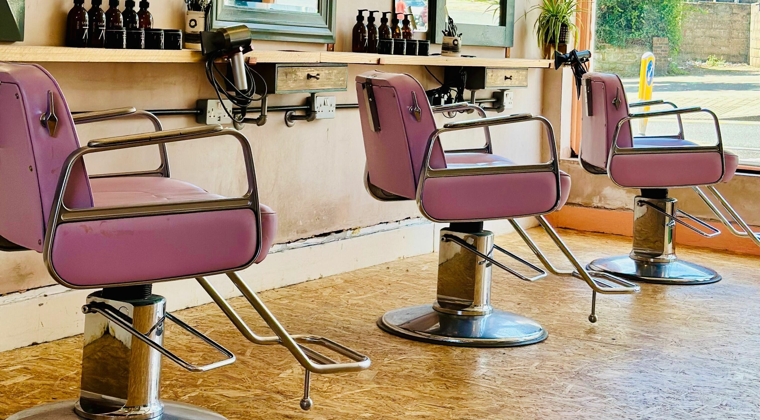 Stylish pink salon chairs at Samli, Saint Leonards-on-sea, England, GB enhance the beauty experience.