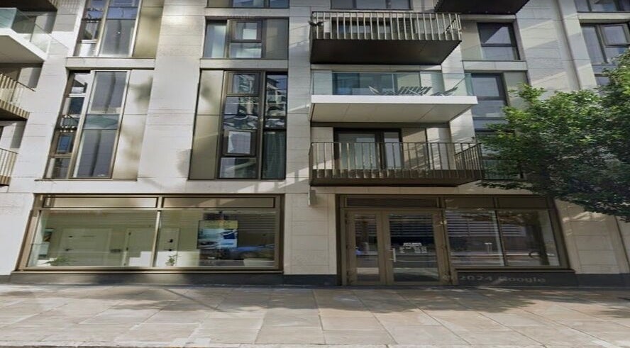 Exterior view of CLINICBYSALMA in London, England, GB, showcasing a modern glass facade.