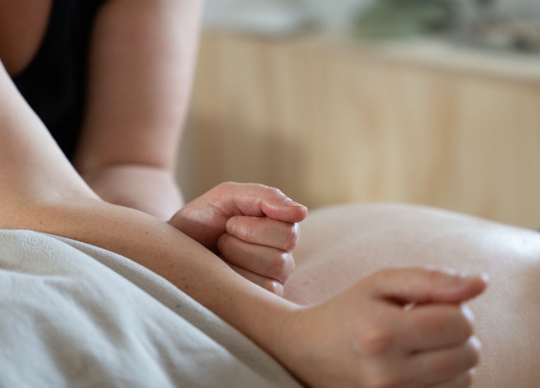 Massage therapy session at Faelt Studio, Birmingham, England, GB, showcasing focused techniques.