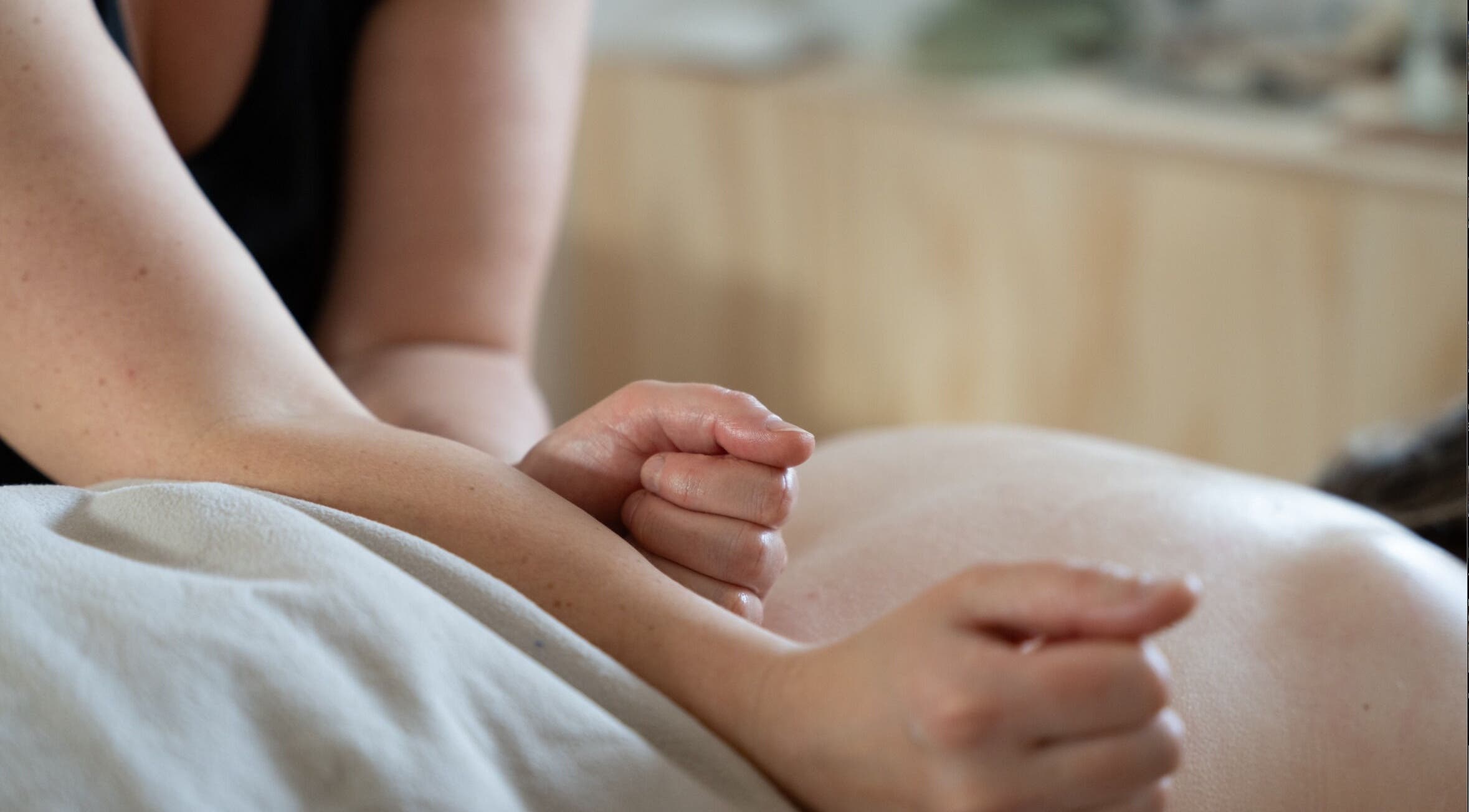 Massage therapy session at Faelt Studio, Birmingham, England, GB, showcasing focused techniques.