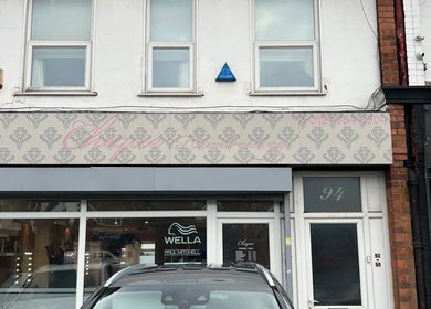Front view of a beauty salon in Birmingham, England, GB, showcasing its elegant exterior design.