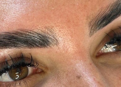 Close-up of expertly shaped eyebrows and lashes at Hatfield SK&CO, Hatfield, England, GB.