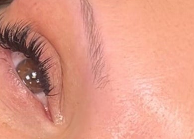 Close-up of a perfectly groomed eye with voluminous lashes at Hatfield SK&CO, Hatfield, England, GB.