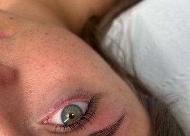 Close-up of a relaxed face showcasing meticulous skincare at Hatfield, England, GB.