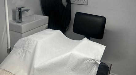 Treatment chair and sink at Halo Beauty Studio, Letchworth Garden City, England, GB.