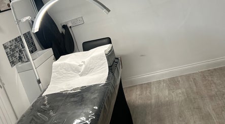 Treatment room at Halo Beauty Studio, Letchworth Garden City, England, GB with a stylish setup.