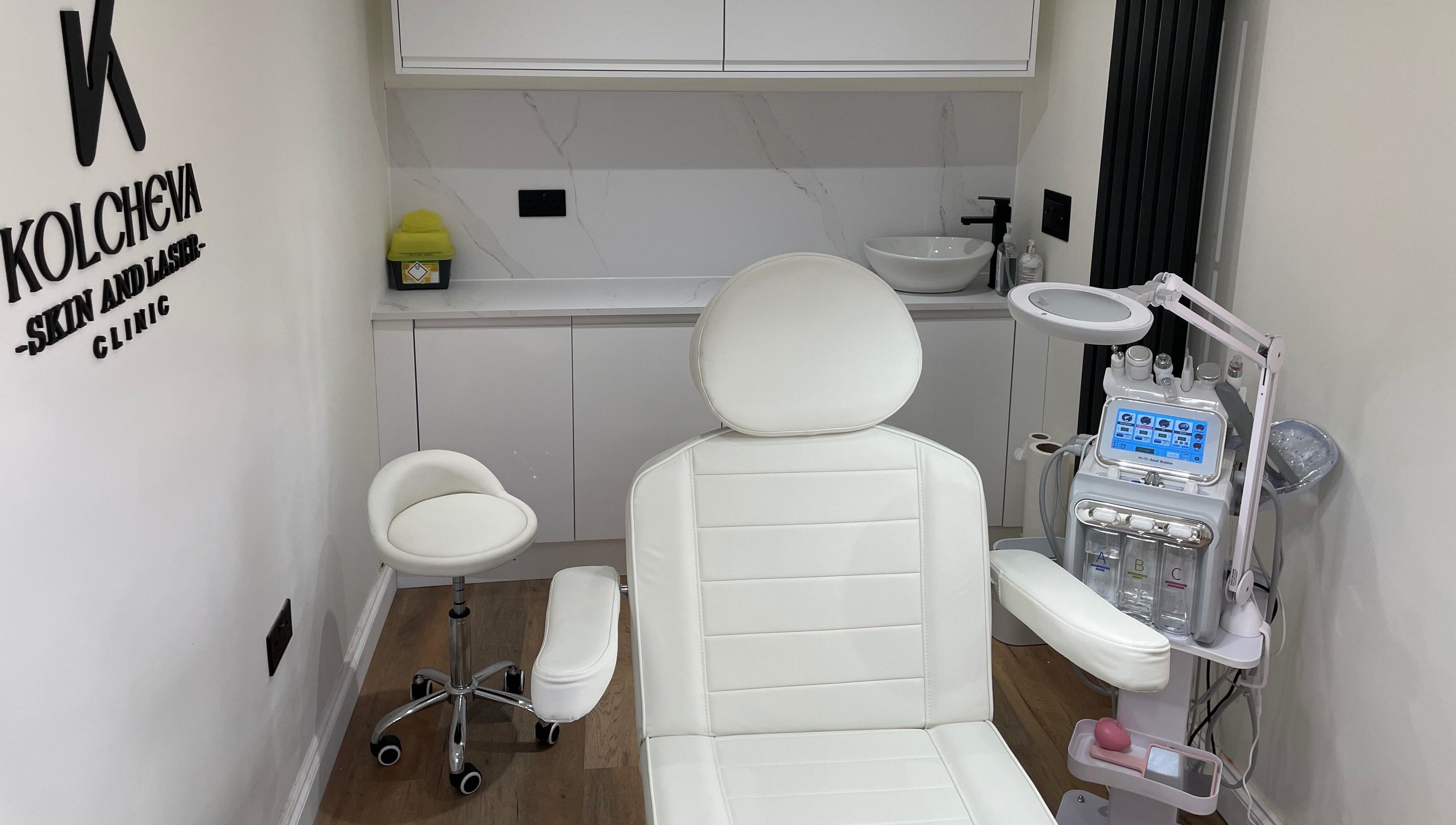 Massage chair in Kolcheva Skin & Laser Clinic, Kirkham, England, GB, with equipment and decor.