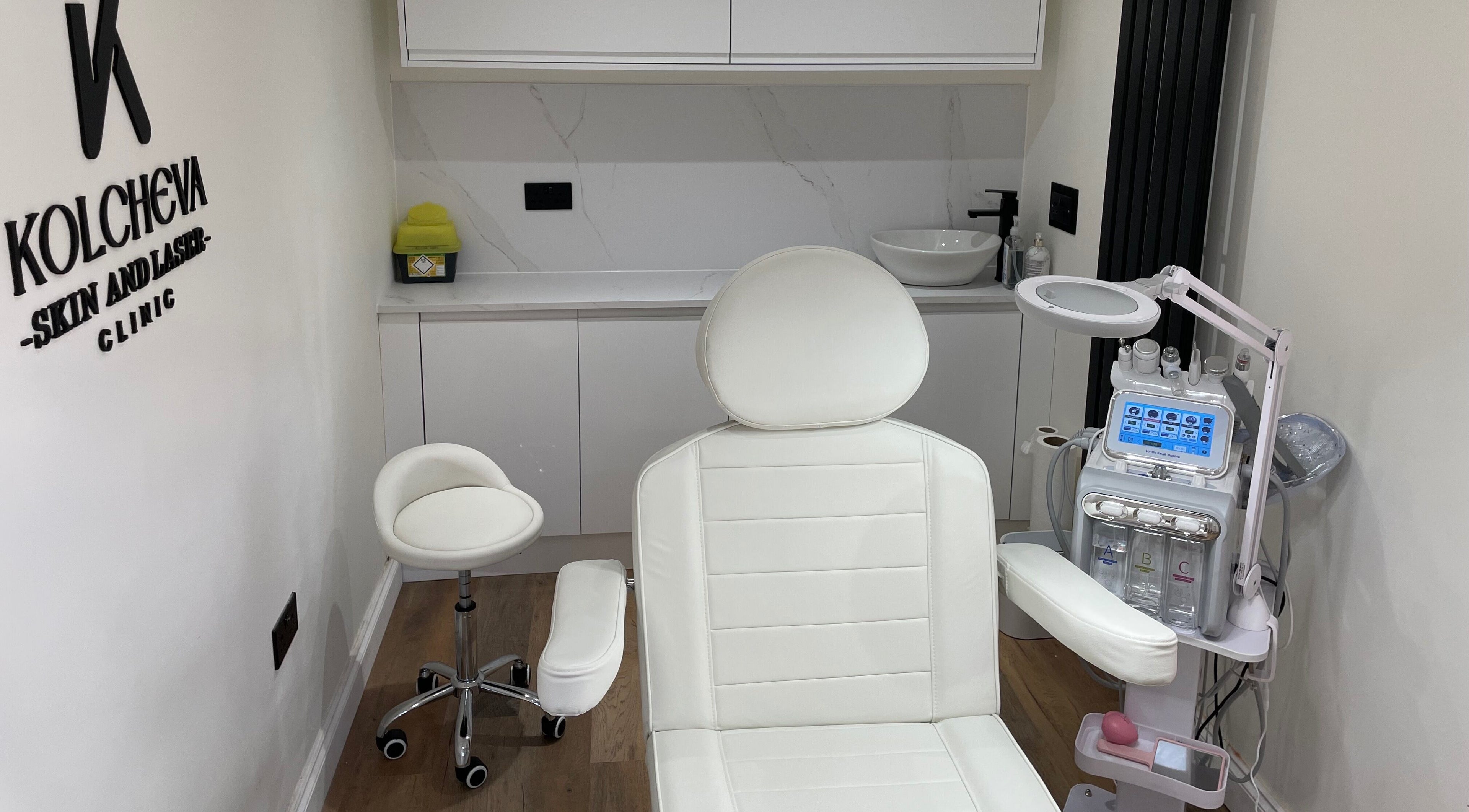 Massage chair in Kolcheva Skin & Laser Clinic, Kirkham, England, GB, with equipment and decor.