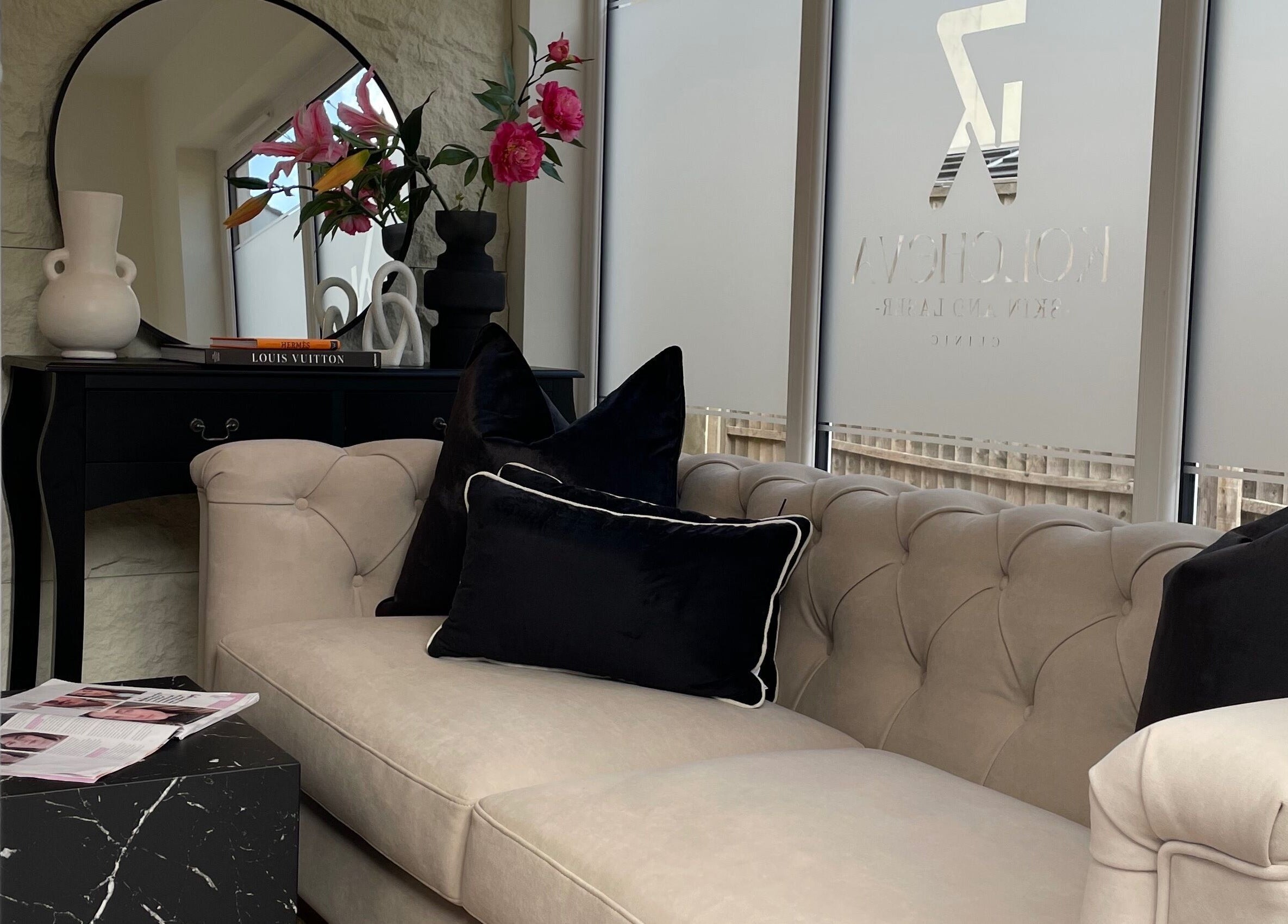 Elegant lounge area at Kolcheva Skin & Laser Clinic, Kirkham, England, GB, featuring plush seating and decor.