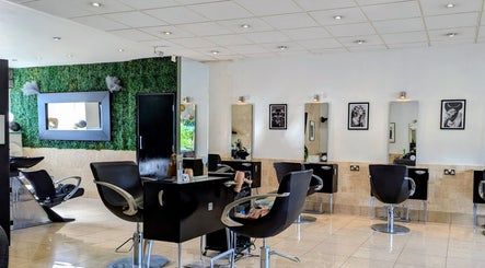 Interior of Bex at Lillywhite & Co. in Wakefield, England, GB showcasing elegant salon chairs and modern decor.