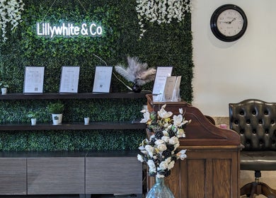 Reception area at Bex at Lillywhite & Co. in Wakefield, England, GB with lush greenery and elegant decor.