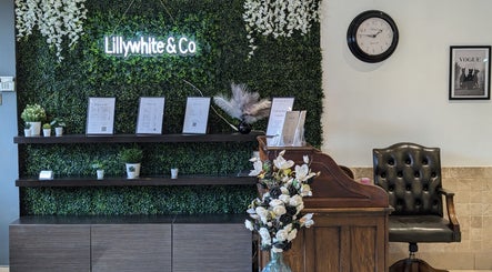 Bex at Lillywhite & Co. reception area with lush greenery and elegant decor in Wakefield, England, GB.