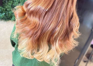 Stunning copper-blonde curls styled at Bex at Lillywhite & Co. in Wakefield, England, GB.