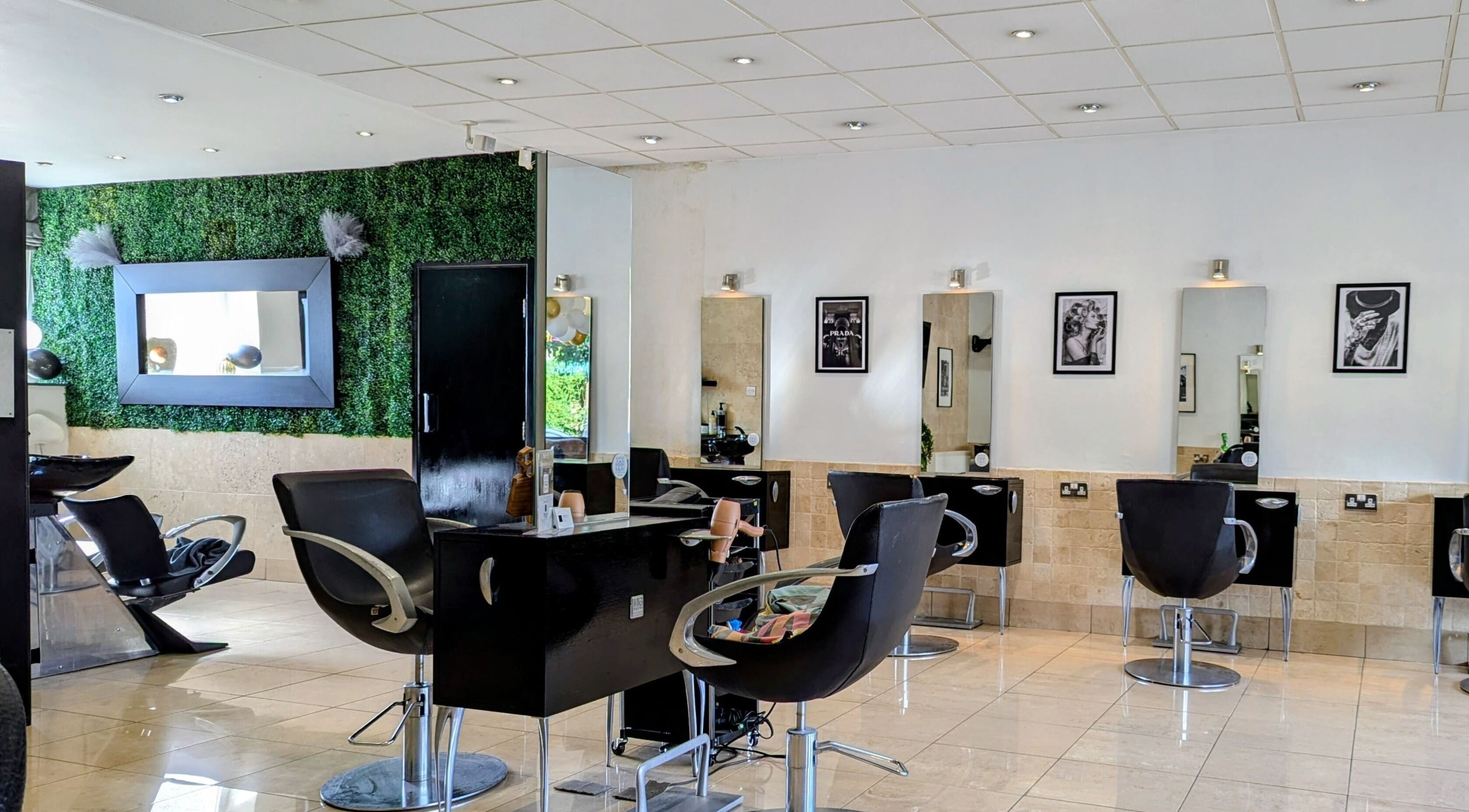Modern salon interior at Bex at Lillywhite & Co., Wakefield, England, GB, featuring stylish chairs and mirrors.